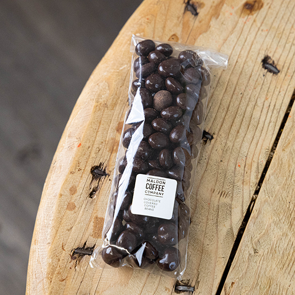 A clear bag of Chocolate Covered Coffee Beans from Maldon Coffee Company.