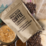 Brown bag of Irish Cream Decaf coffee beans from Maldon Coffee Company.