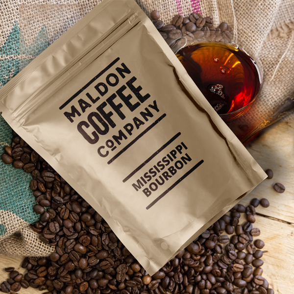 Brown bag of Mississippi Bourbon coffee beans.