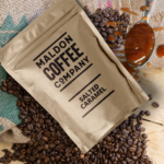 Salted caramel coffee beans in a brown Maldon Coffee Company bag.