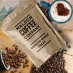 Sealed bag of smooth roast decaf coffee beans from Maldon Coffee Company.