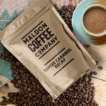 Brown bag of toffee caramel decaf coffee beans from Maldon Coffee Company.