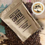 Brown bag of Vanilla Cream coffee beans from Maldon Coffee Company.
